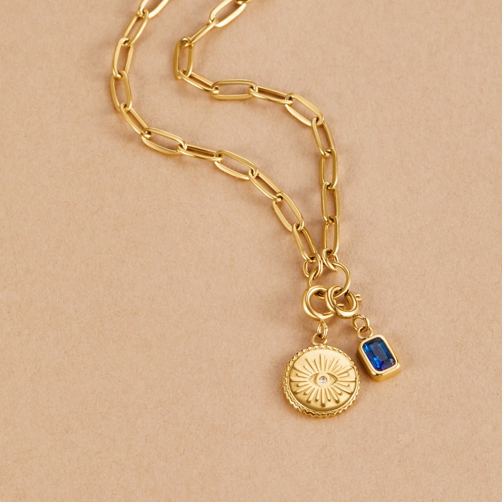 'The Truth' Gold Eye Coin Charm
